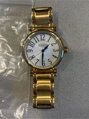 Women’s Coach Gold-Tone Bracelet Watch with White Dial and Blue Hands